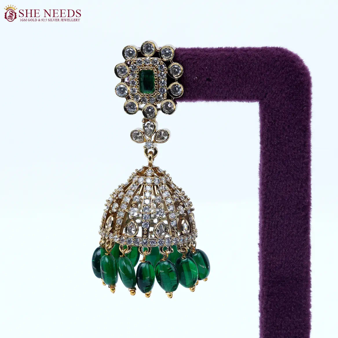 Royal amethyst crystal dome jhumka earrings with green bead drops by She Needs Jewellery