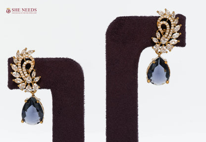 Purple Crystal Drop Earrings with American Diamonds in Gold Plated Finish