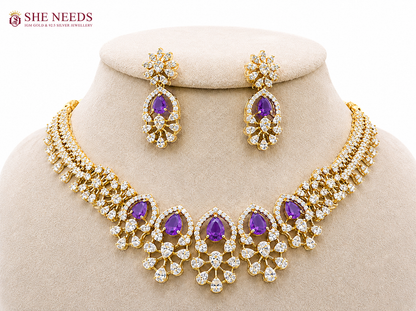 Purple Gold Plated American Diamond Floral Necklace Set with Matching Statement Drop Earrings by She Needs Jewellery