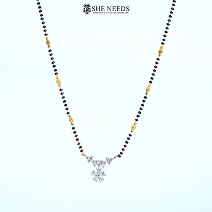Full view of Pushpanjali Gold Plated AD Floral Mangalsutra featuring a sparkling American Diamond flower pendant with black bead chain.|She Needs Jewellery
