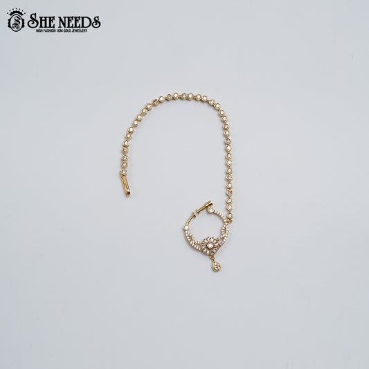 Radiant CZ Nose Ring with Chain featuring a floral-inspired cubic zirconia design, gold finish, and elegant stone-studded chain.|She Needs Jewellery
