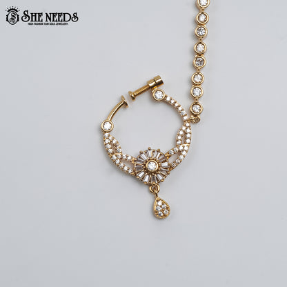 Radiant CZ Nose Ring with Chain featuring a floral-inspired cubic zirconia design, gold finish, and elegant stone-studded chain.|She Needs Jewellery
