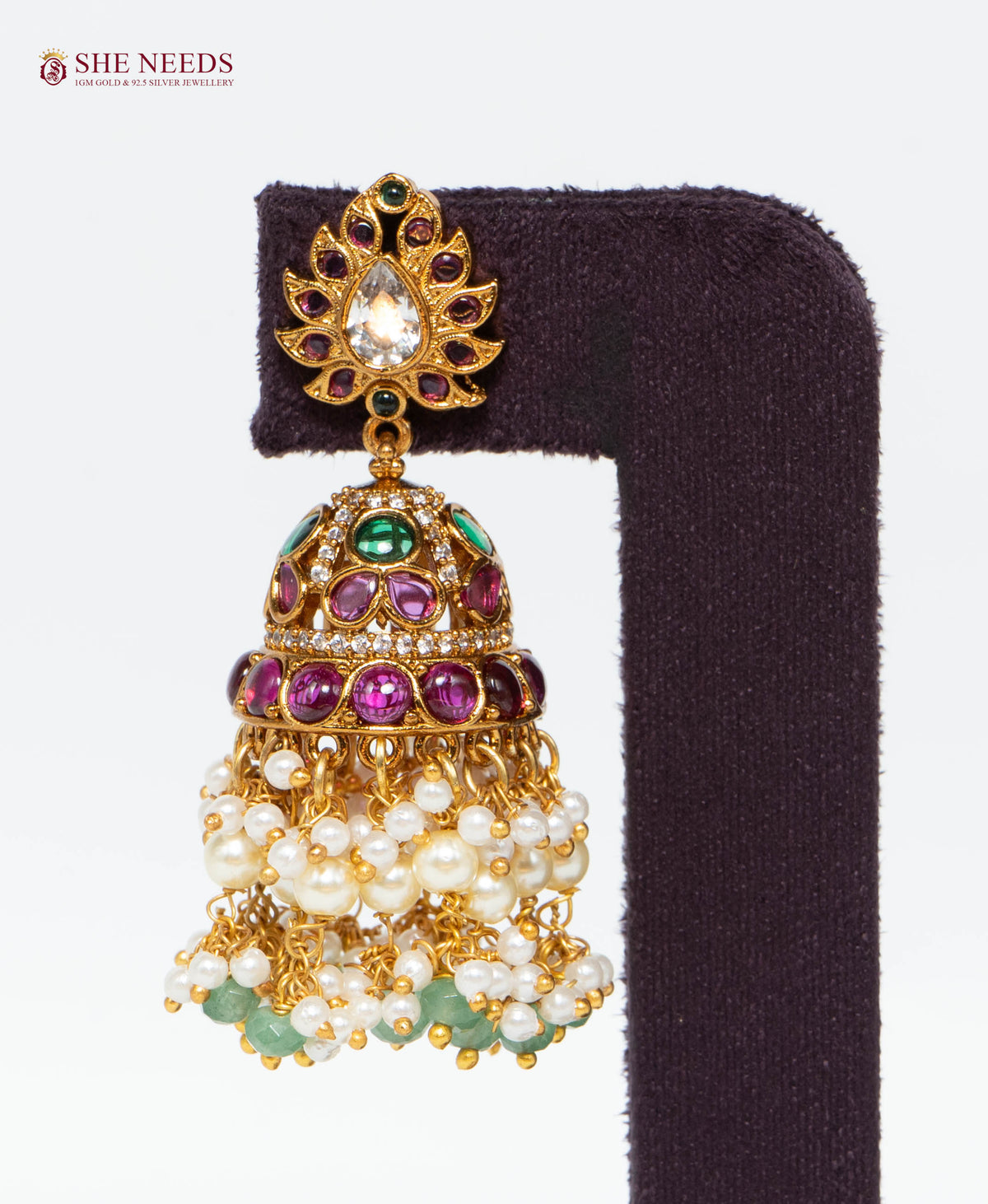 Regal Emerald Pearl Tassel Jhumka Earrings