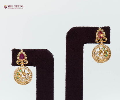 Royal Antique Lakshmi Coin Drop Earrings with Ruby Stone, Emerald Green Accents, White CZ Stones, and Antique Gold Finish