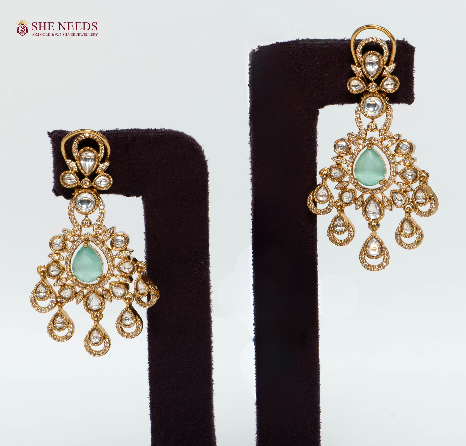 Royal Emerald Kundan Chandelier Earrings with White Kundan Stones and Antique Gold Finish for Bridal, Wedding, and Festive Wear