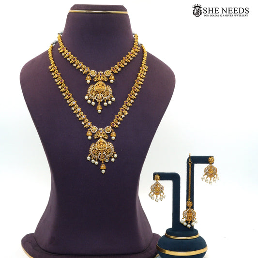 Royal Lakshmi ruby pearl necklace set with matching earrings and maang tikka|She Needs Jewellery
