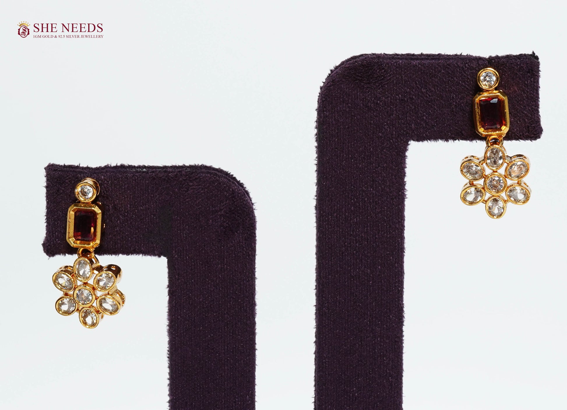 Royal ruby floral drop earrings with American diamonds, gold plating and floral gemstone design|She Needs Jewellery

