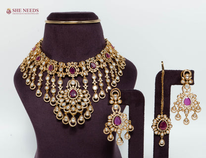 Royal Ruby Kundan Bridal Choker Necklace Set with Matching Earrings and Maang Tikka in Antique Gold Finish for Wedding and Festive Wear