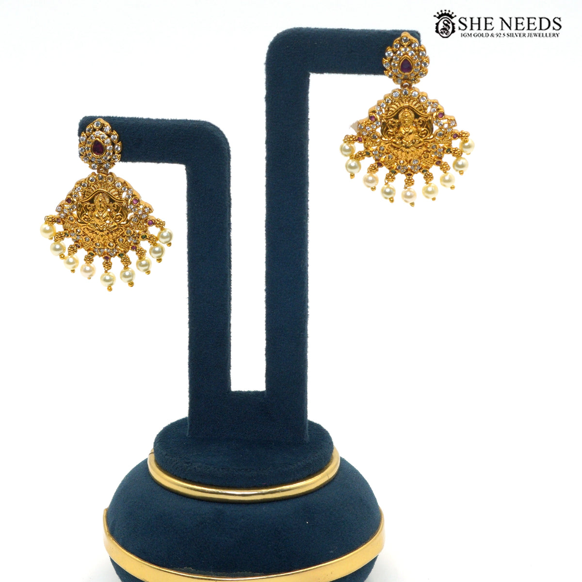 Antique Lakshmi earrings featuring ruby accents, sparkling stones and pearl drops|She Needs Jewellery
