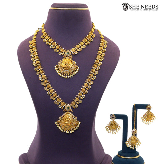Royal ruby and pearl antique Lakshmi necklace set with matching earrings and maang tikka|She Needs Jewellery
