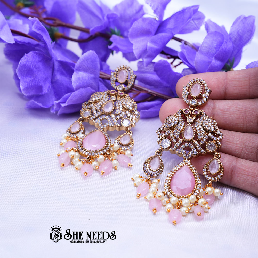 Designer CZ stone chandbali earrings with teardrop stones and pearl bead drops for bridal wear