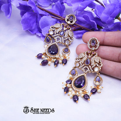 Designer CZ stone chandbali earrings with teardrop stones and pearl bead drops for bridal wear