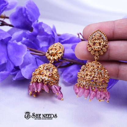 Temple Lakshmi jhumka earrings with CZ stones and green bead drops traditional South Indian jewellery design