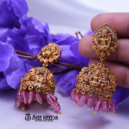 Temple Lakshmi jhumka earrings with CZ stones and green bead drops traditional South Indian jewellery design