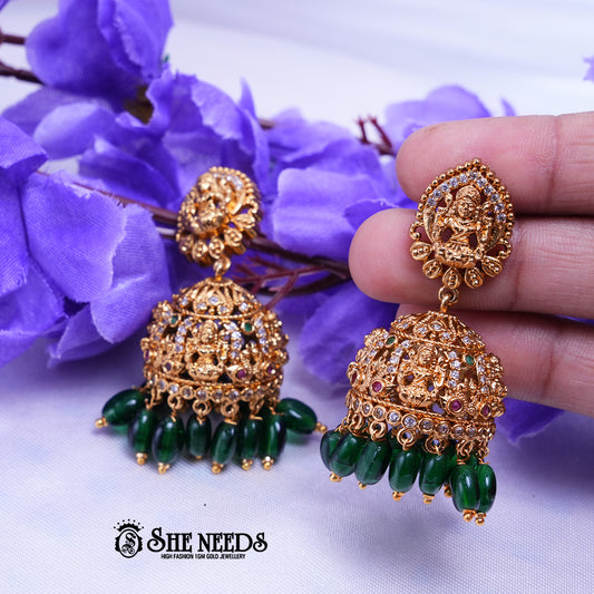 Temple Lakshmi jhumka earrings with CZ stones and green bead drops traditional South Indian jewellery design