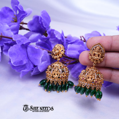 Temple Lakshmi jhumka earrings with CZ stones and green bead drops traditional South Indian jewellery design