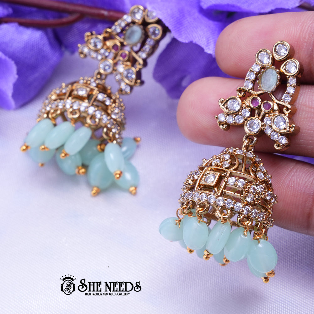 Aarika Antique Gold CZ Stone Jhumka Earrings with Bead Drops | Premium Festive Wear