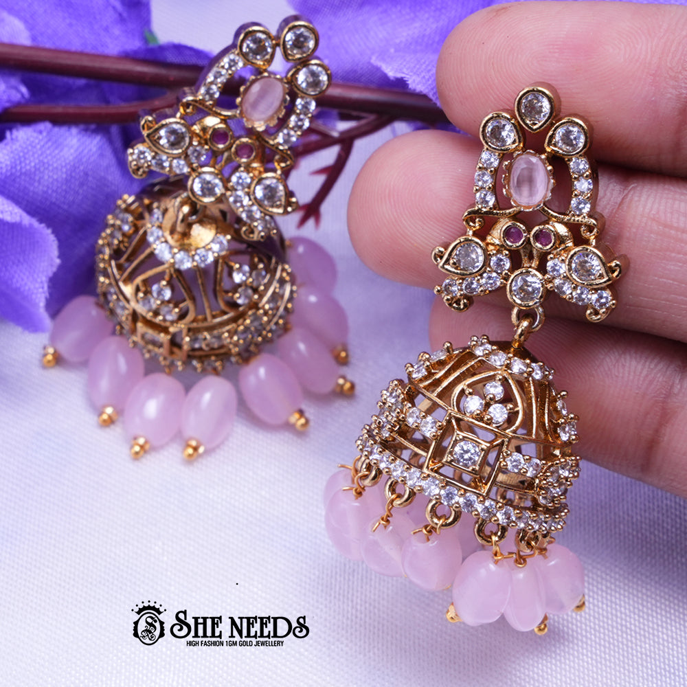 Aarika Antique Gold CZ Stone Jhumka Earrings with Bead Drops | Premium Festive Wear