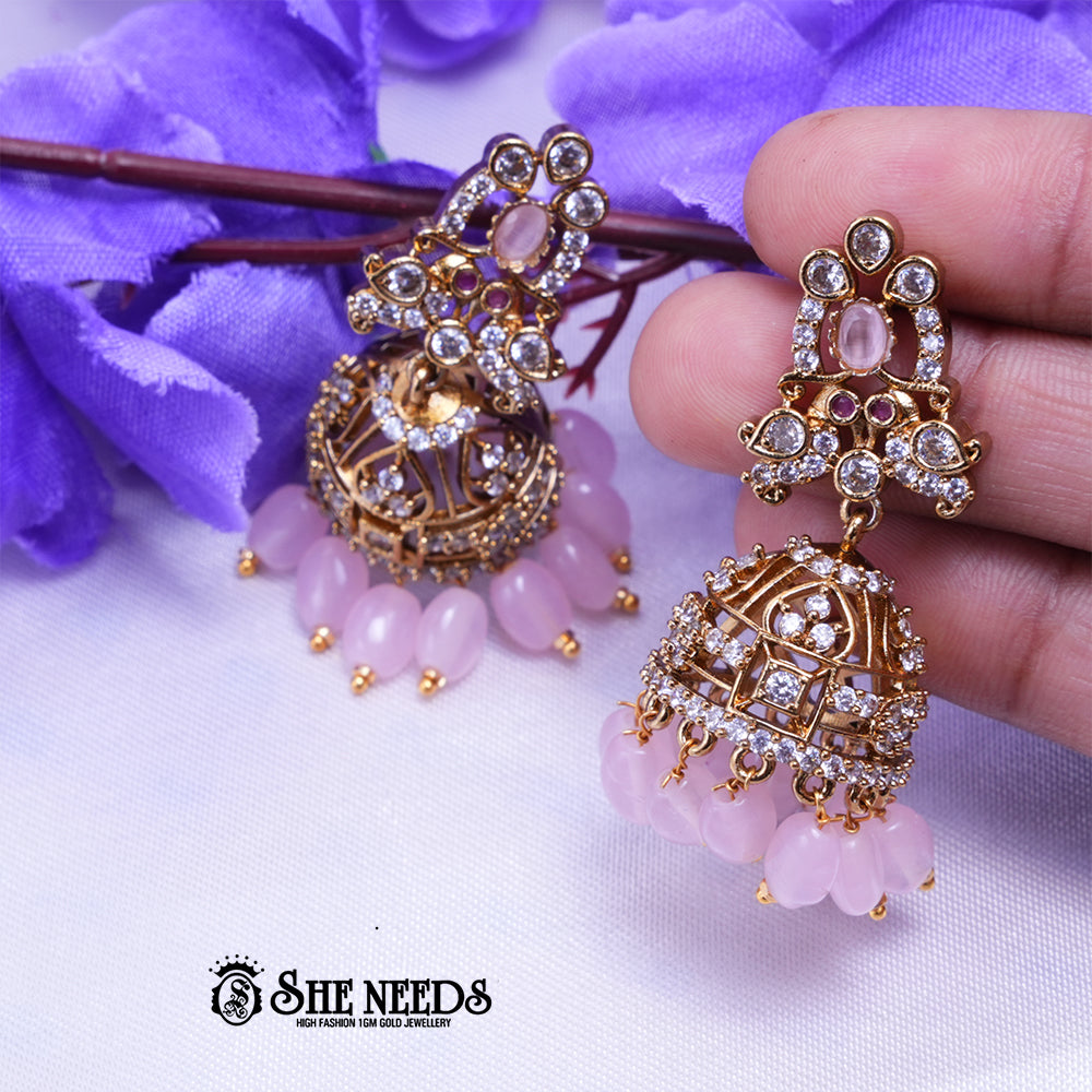 Antique gold jhumka earrings with CZ stones and colorful bead drops for women