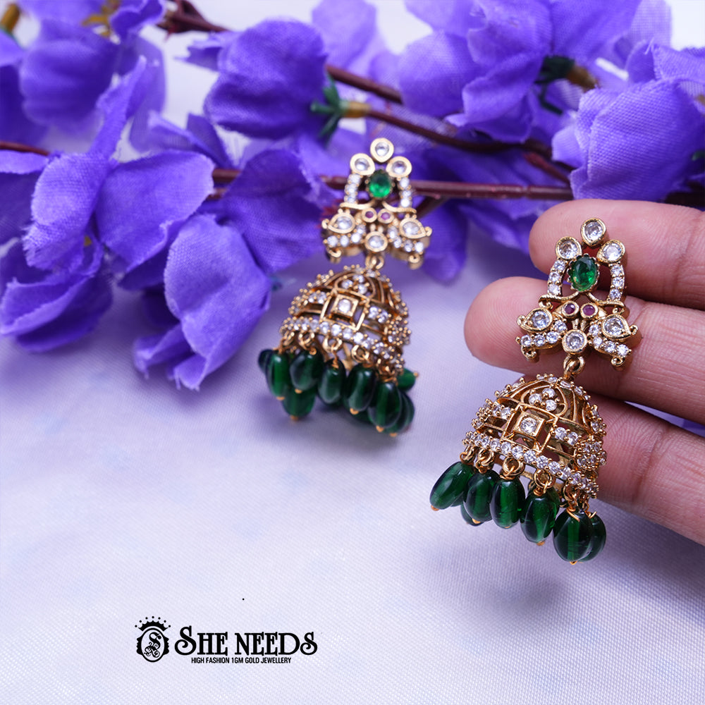 Aarika Antique Gold CZ Stone Jhumka Earrings with Bead Drops | Premium Festive Wear
