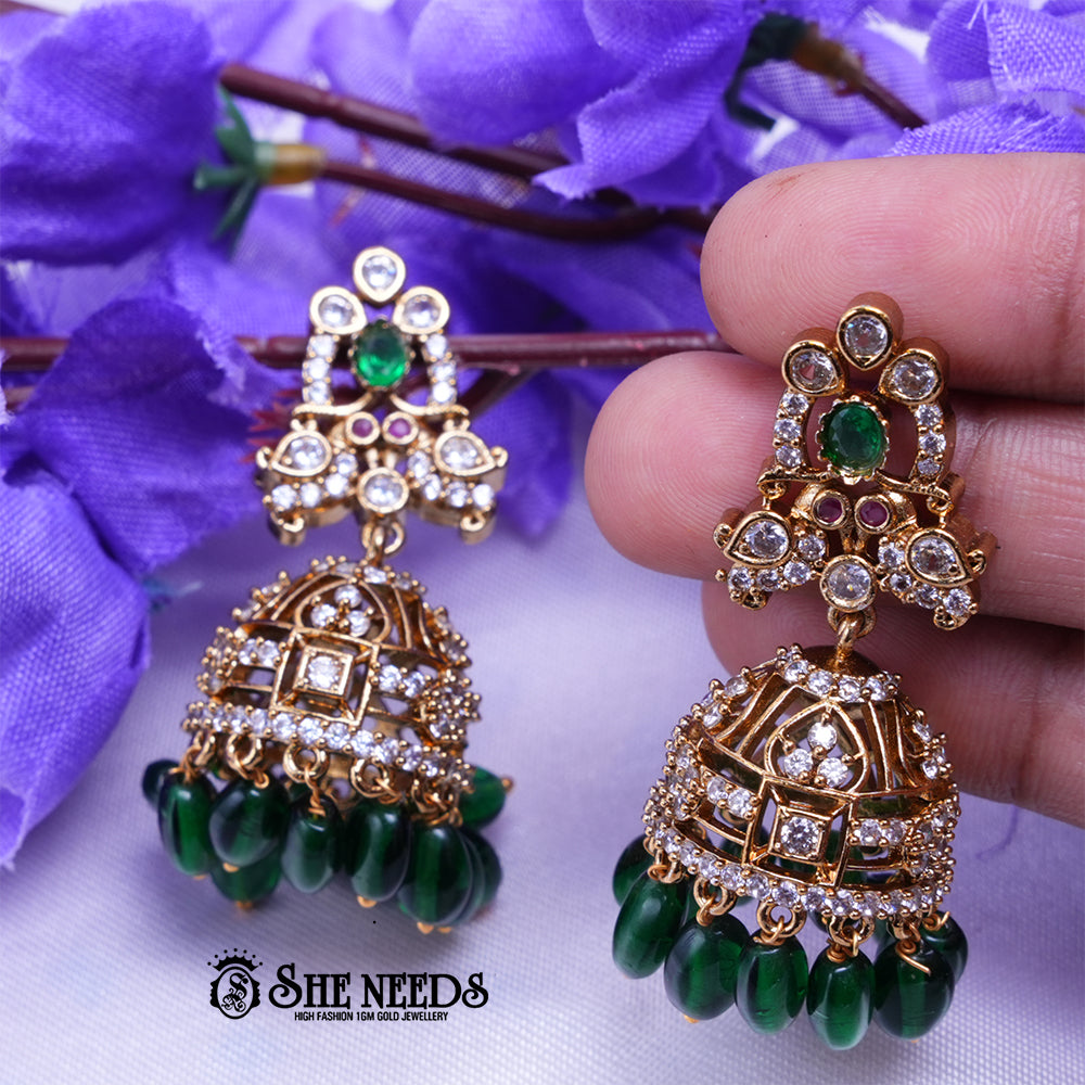Aarika Antique Gold CZ Stone Jhumka Earrings with Bead Drops | Premium Festive Wear