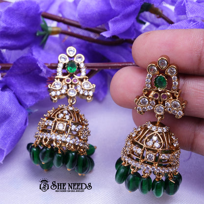 Antique gold jhumka earrings with CZ stones and colorful bead drops for women