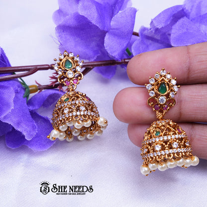 Antique gold jhumka earrings with CZ stones and bead drops by She Needs Jewellery