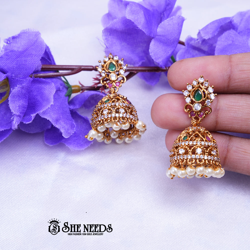 Antique gold jhumka earrings with CZ stones and bead drops by She Needs Jewellery