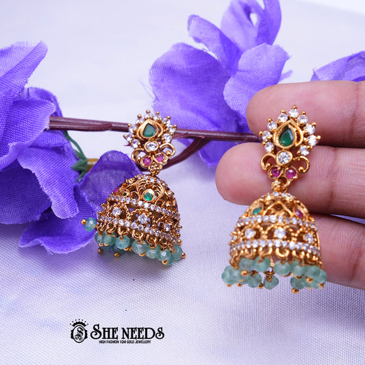 Antique gold jhumka earrings with CZ stones and bead drops by She Needs Jewellery