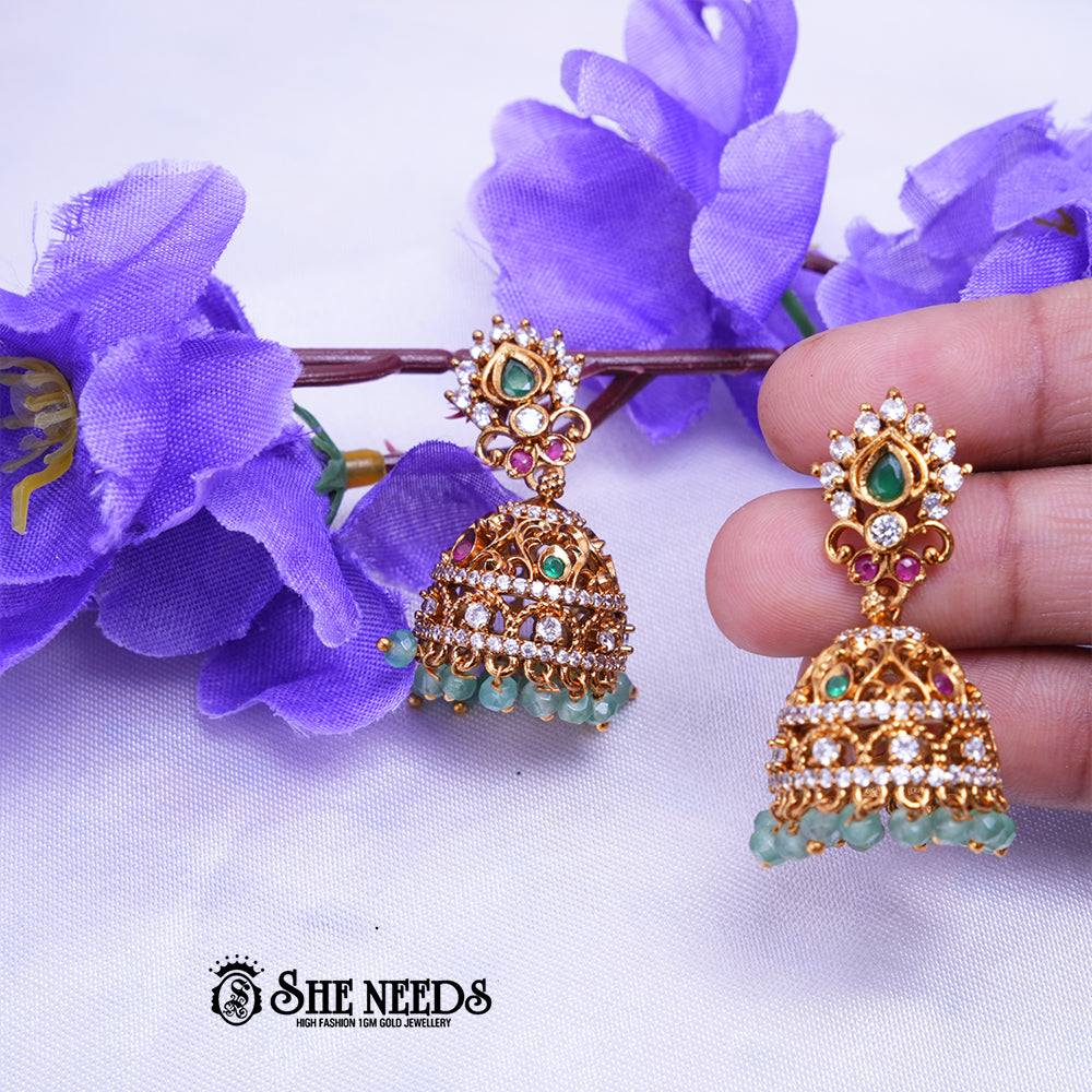 Antique gold jhumka earrings with CZ stones and bead drops by She Needs Jewellery