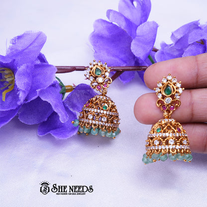 Antique gold jhumka earrings with CZ stones and bead drops by She Needs Jewellery