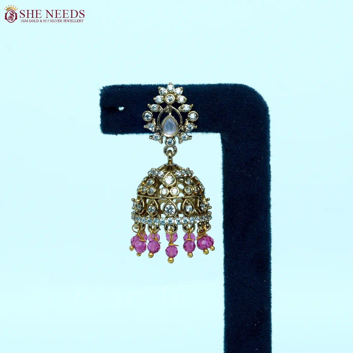 Gold-plated traditional jhumka earrings with light pink bead drops and zircon stones for women|She Needs jewellery