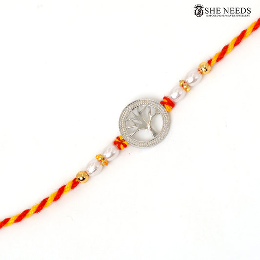Tree of Life 925 silver Rakhi with pearl beads, sparkling stones and red-yellow braided thread|She Needs Jewellery
