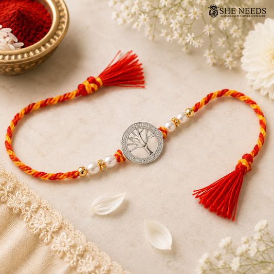 Tree of Life 925 silver Rakhi with pearl beads, sparkling stones and red-yellow braided thread|She Needs Jewellery
