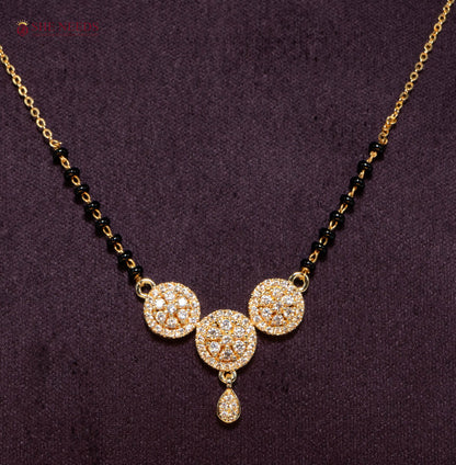 Triveni Trio American Diamond Mangalsutra Necklace with Three Floral CZ Motifs and Black Beads in Gold Plated Finish