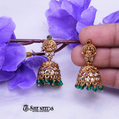 Temple Lakshmi gold jhumka earrings with Green stones and bead drops by She Needs Jewellery