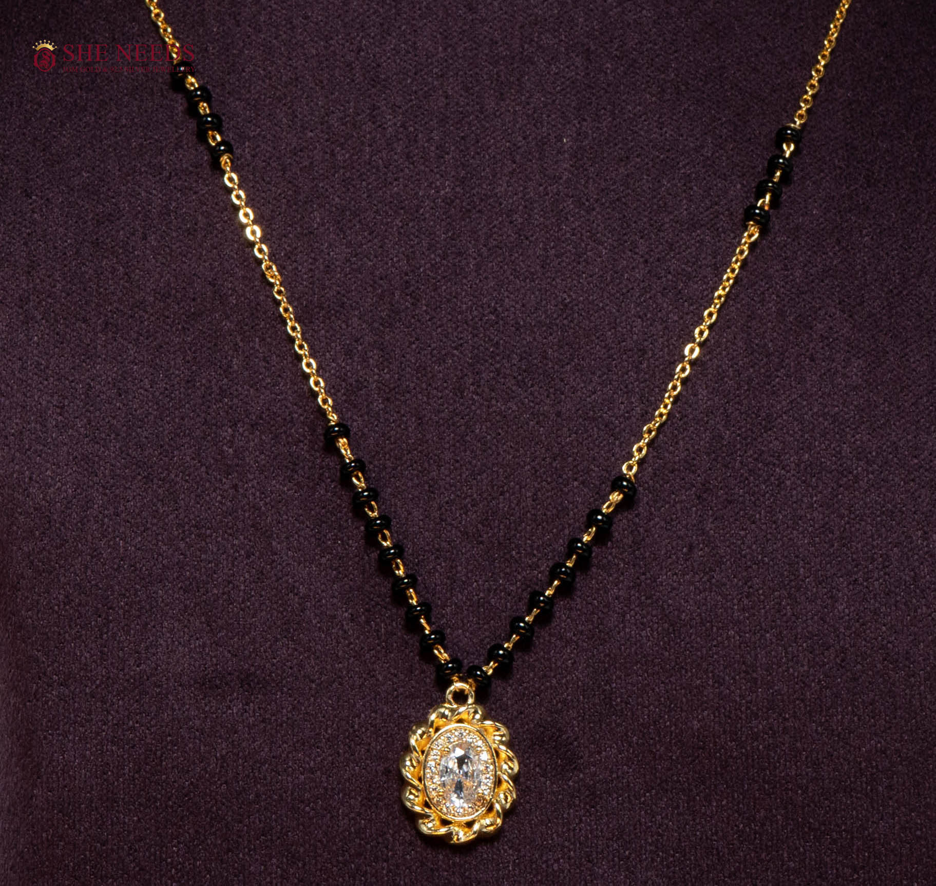 Vaishnavi Oval American Diamond Mangalsutra Necklace with Oval CZ Pendant and Black Beads in Gold Plated Finish