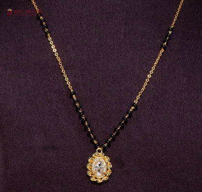 Vaishnavi Oval American Diamond Mangalsutra Necklace with Oval CZ Pendant and Black Beads in Gold Plated Finish