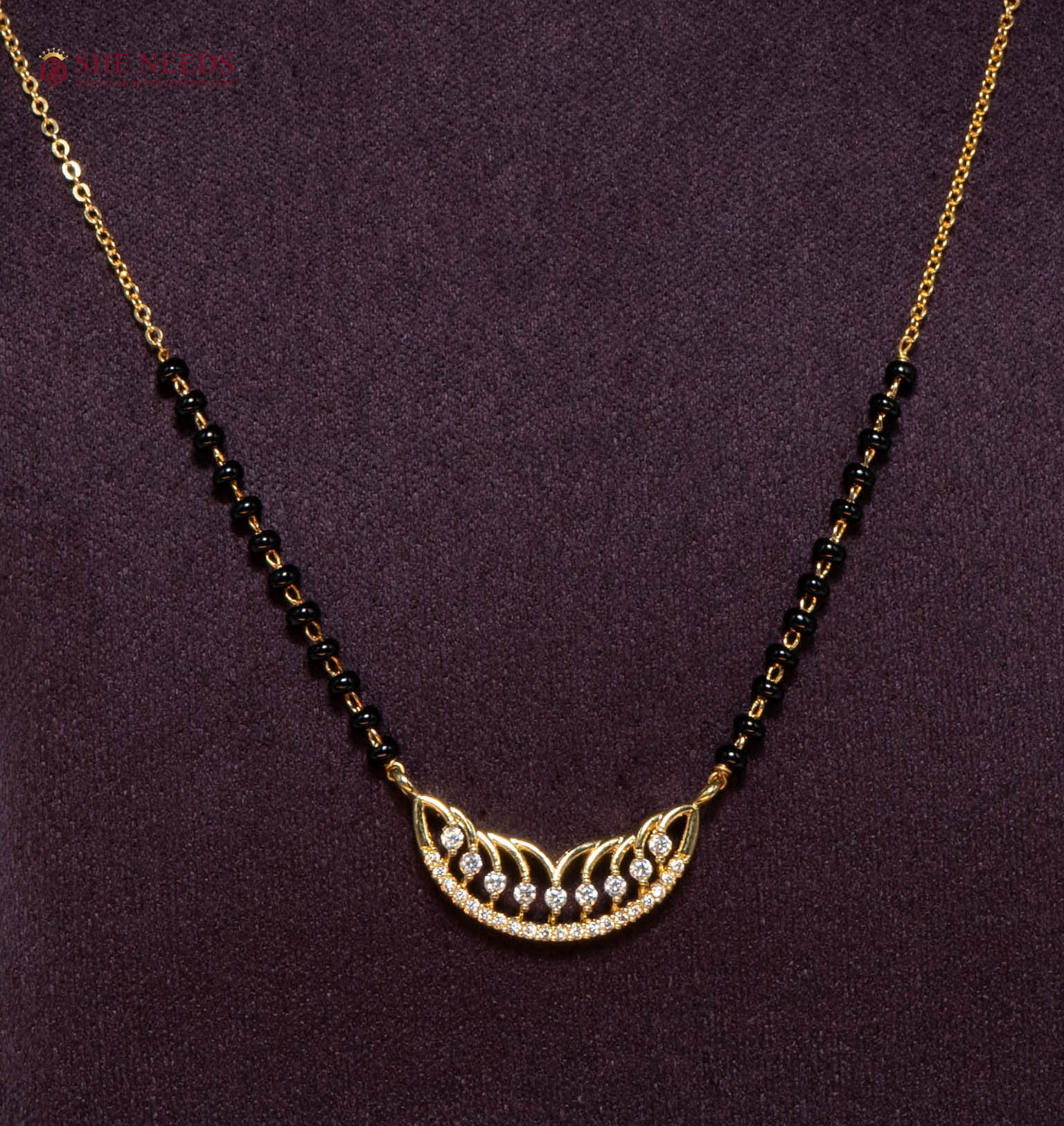 Vedika Crescent American Diamond Mangalsutra Necklace with Curved CZ Pendant and Black Beads in Gold Plated Finish