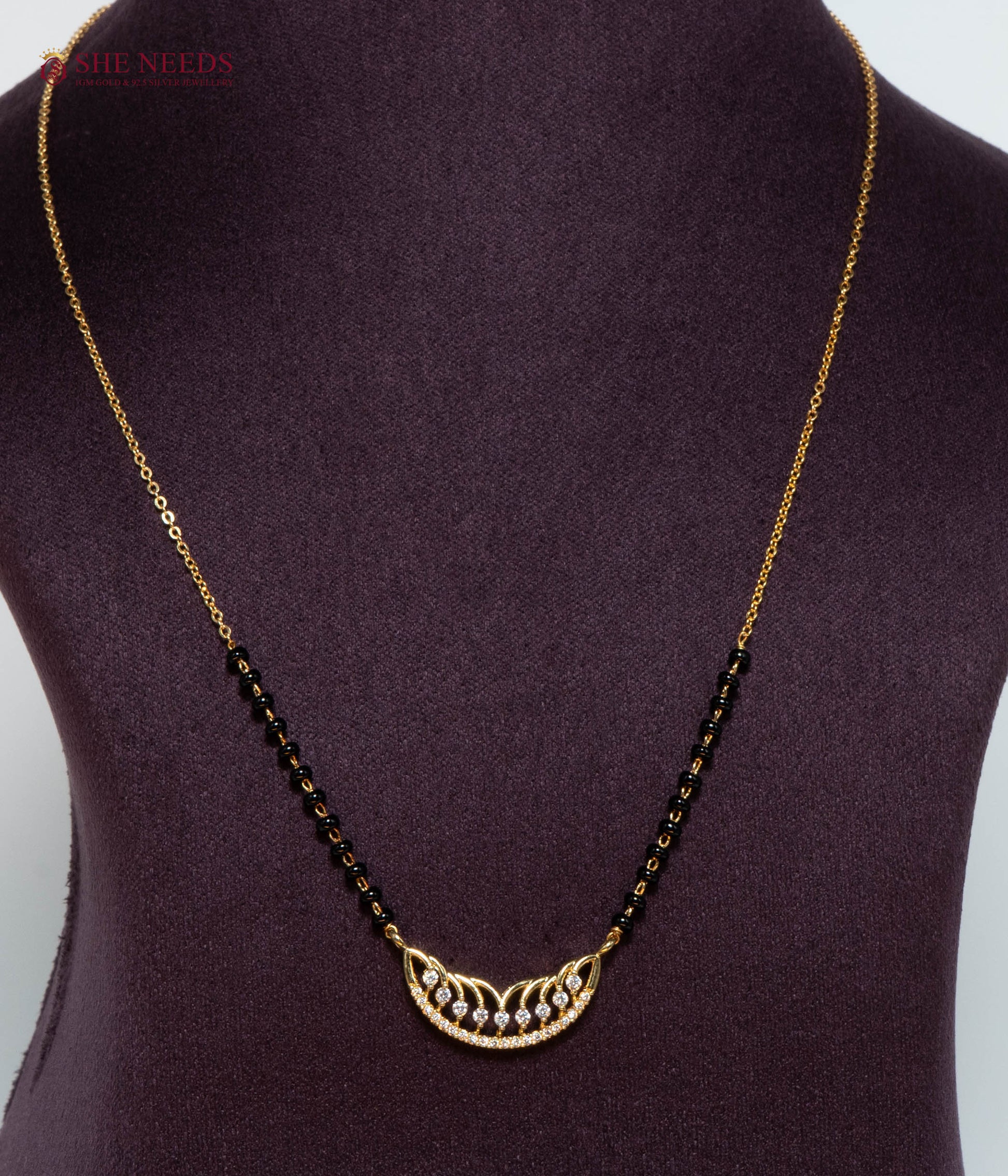 Vedika Crescent American Diamond Mangalsutra Necklace with Curved CZ Pendant and Black Beads in Gold Plated Finish